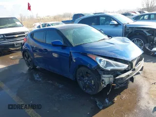 2017 Hyundai Veloster with VIN KMHTC6AD0HU319214, listed as a IAAI auction lot 41345407 with 99,214 mi miles. Bid and sale history available at carsss.com. Image 1.