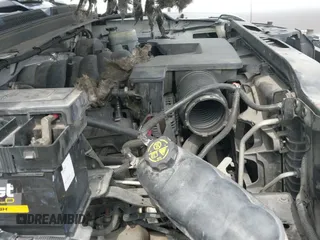 2015 Chevrolet Suburban LT z VIN 1GNSCJKCXFR700715, wystawiony jako IAAI lot #42748716 z przebiegiem 169 082 mil mil oraz . Historia ofert i sprzedaży dostępna na DreamBid. Obrazek 19.