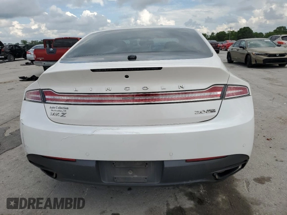 2015 Lincoln MKZ z VIN 3LN6L2J90FR601908, wystawiony jako Copart lot #55516355 z przebiegiem 127 487 mil mil oraz Szkoda całkowita • Salvage title. Historia ofert i sprzedaży dostępna na DreamBid. Obrazek 6.