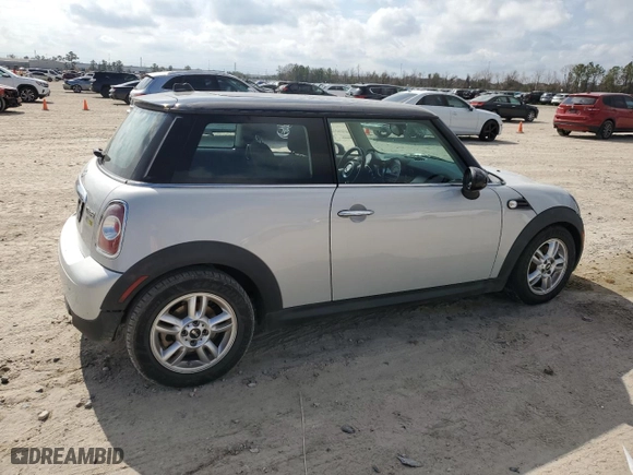 2011 MINI Cooper Hardtop with VIN WMWSU3C5XBTX96096, listed as a Copart auction lot 43148125 with 94,938 mi miles and Salvage Title. Bid and sale history available at carsss.com. Image 3.