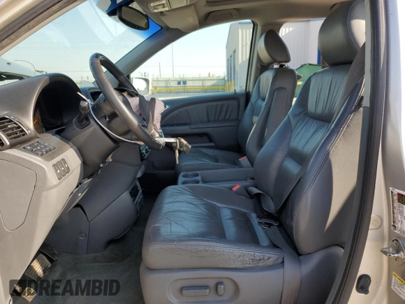 2007 Honda Odyssey Touring with VIN 5FNRL38817B099305, listed as a Copart auction lot 52005335 with 215,799 mi miles and Salvage Title. Bid and sale history available at carsss.com. Image 7.