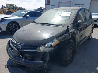 2012 Nissan Versa S with VIN 3N1BC1CPXCK250702, listed as a IAAI auction lot 41899436 with 136,378 mi miles. Bid and sale history available at carsss.com. Image 2.