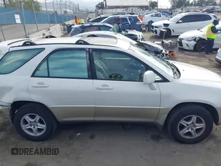 2000 Lexus RX 300 z VIN JT6HF10U8Y0098868, wystawiony jako IAAI lot #41878449 z przebiegiem 162 170 mil mil oraz . Historia ofert i sprzedaży dostępna na DreamBid. Obrazek 13.