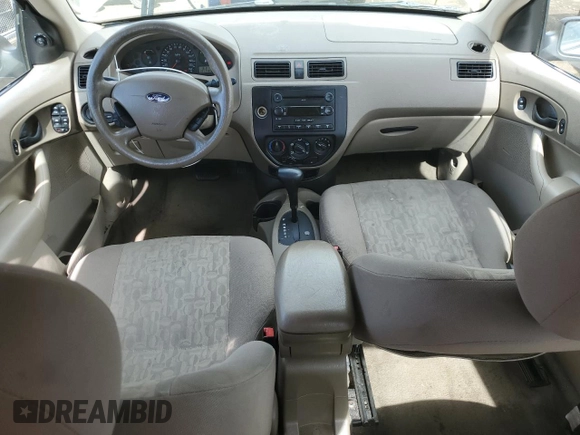 2005 Ford Focus S with VIN 1FAFP34NX5W263944, listed as a Copart auction lot 52973945 with 201,348 mi miles and Salvage Title. Bid and sale history available at carsss.com. Image 8.