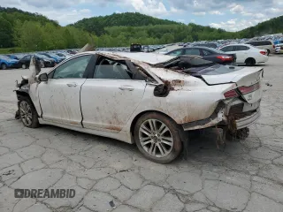 2014 Lincoln MKZ Hybrid с VIN 3LN6L2LU3ER833502, выставлен на аукционе Copart как лот 55996595 с пробегом Не указан миль и Списание • Salvage title. История ставок и продаж доступна на DreamBid. Изображение 2.