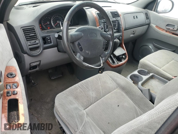 2005 Kia Sedona LX with VIN KNDUP132656679325, listed as a Copart auction lot 47759705 with 143,980 mi miles and Salvage Title. Bid and sale history available at carsss.com. Image 8.