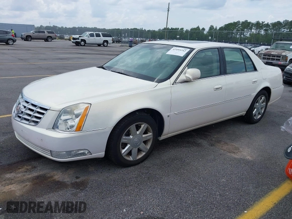 2007 Cadillac DTS Luxury I z VIN 1G6KD57Y67U123765, wystawiony jako IAAI lot #42495242 z przebiegiem 56 193 mil mil oraz . Historia ofert i sprzedaży dostępna na DreamBid. Obrazek 2.