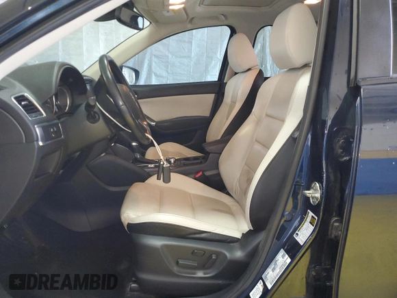 2016 Mazda CX-5 Grand Touring with VIN JM3KE4DY0G0813499, listed as a Copart auction lot 54174805 with 116,709 mi miles and Clean Title. Bid and sale history available at carsss.com. Image 7.