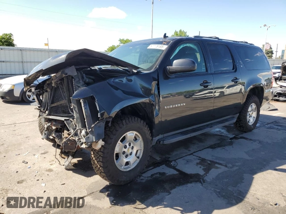2013 Chevrolet Suburban LT with VIN 1GNSKJE70DR138631, listed as a Copart auction lot 57778185 with 176,934 mi miles and Salvage title. Bid and sale history available at DreamBid. Image 1.