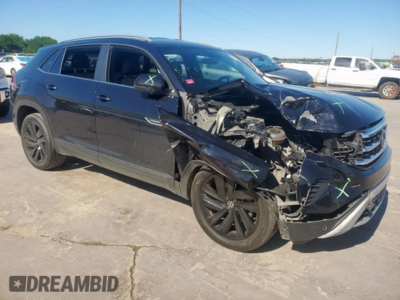 2022 Volkswagen Atlas SE with VIN 1V2WE2CA5NC200212, listed as a Copart auction lot 57658035 with 49,223 mi miles and Salvage title. Bid and sale history available at DreamBid. Image 4.