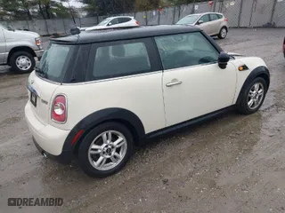 2012 MINI Cooper Hardtop with VIN WMWSU3C5XCT542275, listed as a IAAI auction lot 41870576 with 84,712 mi miles. Bid and sale history available at carsss.com. Image 4.