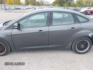2016 Ford Focus SE with VIN 1FADP3F2XGL280855, listed as a IAAI auction lot 40380378 with 173,877 mi miles and . Bid and sale history available at carsss.com. Image 14.