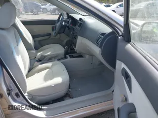 2005 Kia Spectra LX with VIN KNAFE121355203561, listed as a IAAI auction lot 41894533 with 32,889 mi miles. Bid and sale history available at carsss.com. Image 5.