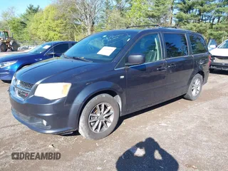 2014 Dodge Grand Caravan SXT with VIN 2C4RDGCG0ER223309, listed as a IAAI auction lot 42161438 with 175,867 mi miles and . Bid and sale history available at DreamBid. Image 2.