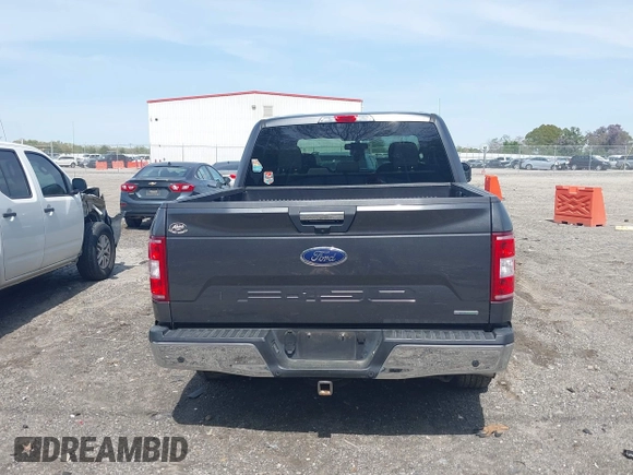 2018 Ford F-150 XL with VIN 1FTEW1CP2JFB50015, listed as a IAAI auction lot 41938177 with 248,137 mi miles and . Bid and sale history available at DreamBid. Image 16.