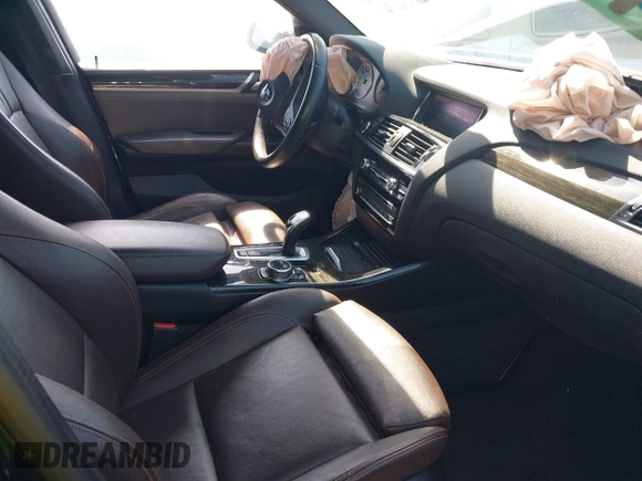 2015 BMW X4 xDrive35i with VIN 5UXXW5C50F0E87728, listed as a IAAI auction lot 41819628 with 136,042 mi miles and . Bid and sale history available at DreamBid. Image 5.