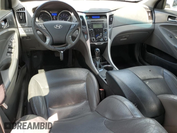 2012 Hyundai Sonata Hybrid z VIN KMHEC4A43CA059186, wystawiony jako Copart lot #55575405 z przebiegiem 217 801 mil mil oraz Szkoda całkowita • Salvage title. Historia ofert i sprzedaży dostępna na DreamBid. Obrazek 8.