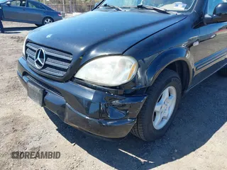 2001 Mercedes-Benz M 320/430/500 with VIN 4JGAB54E41A232917, listed as a IAAI auction lot 42055379 with 187,008 mi miles and . Bid and sale history available at DreamBid. Image 6.
