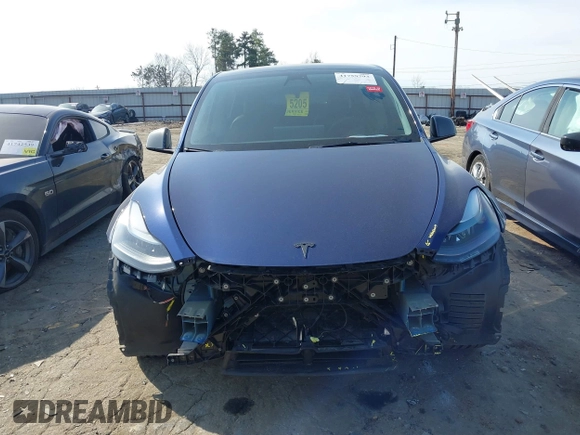 2022 Tesla Model Y Performance with VIN 7SAYGDEF7NF497076, listed as a IAAI auction lot 41759793 with 46,970 mi miles and . Bid and sale history available at DreamBid. Image 12.
