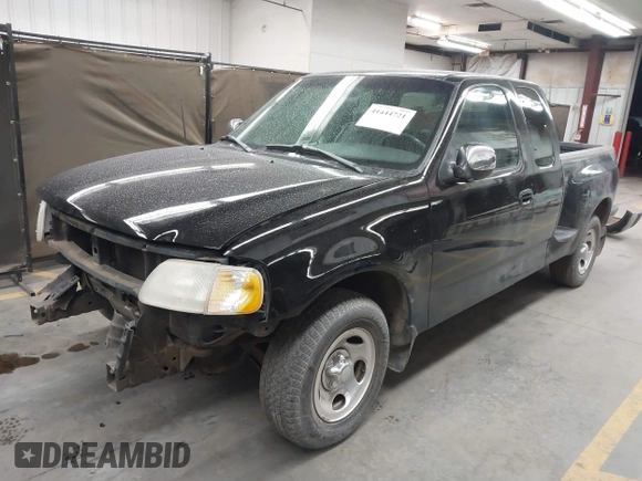 2001 Ford F-150 XL with VIN 1FTRX07W61KF82074, listed as a IAAI auction lot 41444721 with 125,494 mi miles. Bid and sale history available at carsss.com. Image 2.