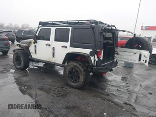 2016 Jeep Wrangler Unlimited Rubicon with VIN 1C4BJWFGXGL185227, listed as a IAAI auction lot 41555159 with 1 mi miles. Bid and sale history available at carsss.com. Image 3.