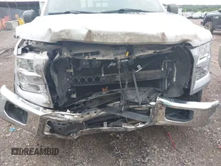 2015 Ford F-150 XL with VIN 1FTEW1CP4FKD88530, listed as a IAAI auction lot 42509147 with 98,716 mi miles and . Bid and sale history available at DreamBid. Image 20.
