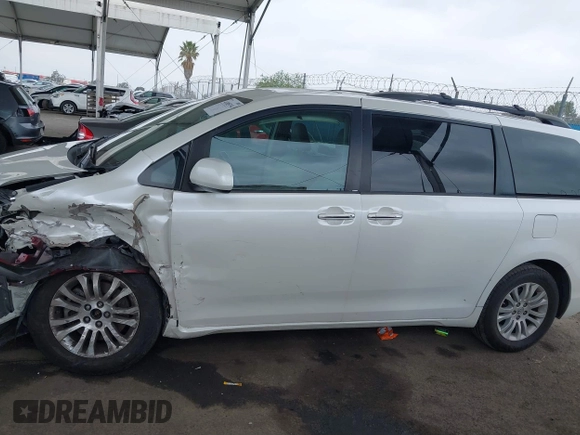 2015 Toyota Sienna XLE with VIN 5TDYK3DC5FS640102, listed as a IAAI auction lot 41885194 with 119,972 mi miles. Bid and sale history available at carsss.com. Image 14.