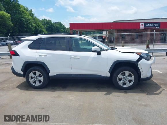 2019 Toyota RAV4 XLE with VIN 2T3P1RFV0KC008652, listed as a IAAI auction lot 42508557 with 87,684 mi miles and . Bid and sale history available at DreamBid. Image 13.
