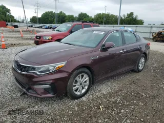 2019 Kia Optima LX z VIN 5XXGT4L36KG285453, wystawiony jako Copart lot #58788485 z przebiegiem 175 607 mil mil oraz Czysty tytuł • Clean title. Historia ofert i sprzedaży dostępna na DreamBid. Obrazek 1.