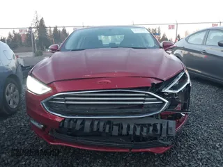 2017 Ford Fusion Energi SE with VIN 3FA6P0PU3HR277659, listed as a IAAI auction lot 41297011 with 119,244 mi miles. Bid and sale history available at carsss.com. Image 12.