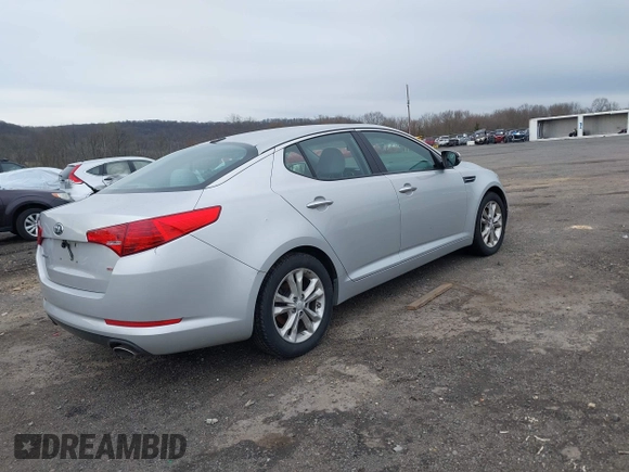 2013 Kia Optima LX with VIN 5XXGM4A74DG129353, listed as a IAAI auction lot 42035909 with 140,315 mi miles. Bid and sale history available at carsss.com. Image 4.