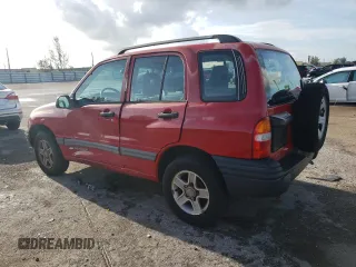 2003 Chevrolet Tracker z VIN 2CNBE13CX36943395, wystawiony jako Copart lot #70964574 z przebiegiem 118 975 mil mil oraz Szkody całkowita. Historia ofert i sprzedaży dostępna na DreamBid. Obrazek 2.