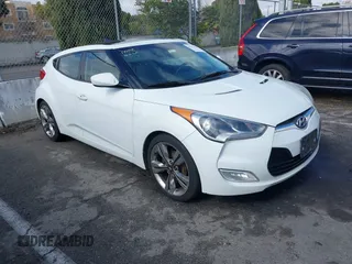 2012 Hyundai Veloster w/Gray Int с VIN KMHTC6ADXCU027658, выставлен на аукционе IAAI как лот 41517929 с пробегом 142 884 миль миль и . История ставок и продаж доступна на DreamBid. Изображение 1.