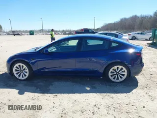 2021 Tesla Model 3 Long Range with VIN 5YJ3E1EB3MF031457, listed as a IAAI auction lot 41630758 with 71,113 mi miles and . Bid and sale history available at carsss.com. Image 14.
