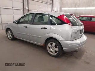 2005 Ford Focus S with VIN 3FAFP37N15R138393, listed as a IAAI auction lot 42106817 with 144,047 mi miles and . Bid and sale history available at carsss.com. Image 3.