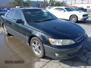 2001 Lexus ES 300 with VIN JT8BF28GX10317370, listed as a IAAI auction lot 41512950 with 221,206 mi miles. Bid and sale history available at carsss.com. Image 1.