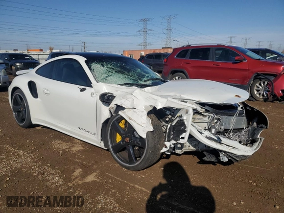 2015 Porsche 911 Turbo S with VIN WP0AD2A9XFS160370, listed as a Copart auction lot 77165054 with 19,235 mi miles and Salvage Title. Bid and sale history available at DreamBid. Image 4.