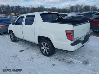 2014 Honda Ridgeline SE with VIN 5FPYK1F6XEB007553, listed as a IAAI auction lot 41281193 with 159,699 mi miles. Bid and sale history available at carsss.com. Image 3.