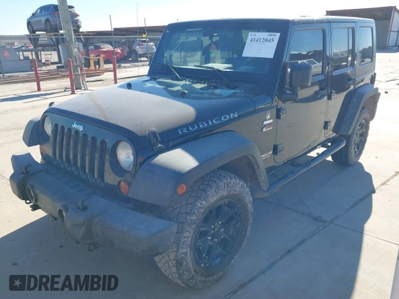2008 Jeep Wrangler Unlimited Rubicon with VIN 1J8GA69198L574593, listed as a IAAI auction lot 41412045 with 174,727 mi miles and . Bid and sale history available at DreamBid. Image 21.