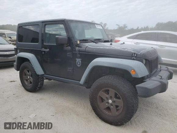 2011 Jeep Wrangler Rubicon with VIN 1J4BA6D15BL585388, listed as a Copart auction lot 76272184 with 119,043 mi miles and Clean title. Bid and sale history available at DreamBid. Image 4.