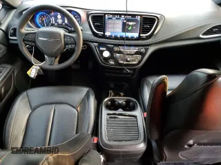 2023 Chrysler Pacifica Touring L with VIN 2C4RC1BG4PR505313, listed as a Copart auction lot 54069305 with 24,687 mi miles and Salvage title. Bid and sale history available at DreamBid. Image 8.