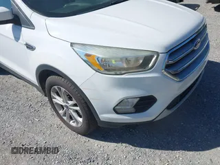 2017 Ford Escape SE with VIN 1FMCU9GD3HUA40233, listed as a IAAI auction lot 42126271 with 284,937 mi miles. Bid and sale history available at carsss.com. Image 6.