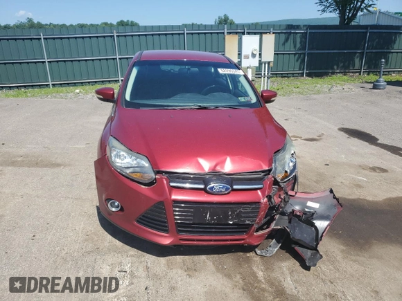 2014 Ford Focus Titanium z VIN 1FADP3N29EL409568, wystawiony jako Copart lot #62295345 z przebiegiem 53 401 mil mil oraz Szkoda całkowita • Salvage title. Historia ofert i sprzedaży dostępna na DreamBid. Obrazek 5.
