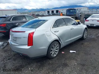 2017 Cadillac ATS Sedan AWD with VIN 1G6AG5RX4H0176223, listed as a IAAI auction lot 41980295 with 105,860 mi miles. Bid and sale history available at carsss.com. Image 4.