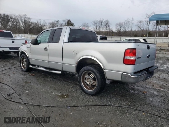 2004 Ford F-150 STX with VIN 1FTRX12W04NB26894, listed as a Copart auction lot 42958345 with 986,965 mi miles and Salvage Title. Bid and sale history available at carsss.com. Image 2.
