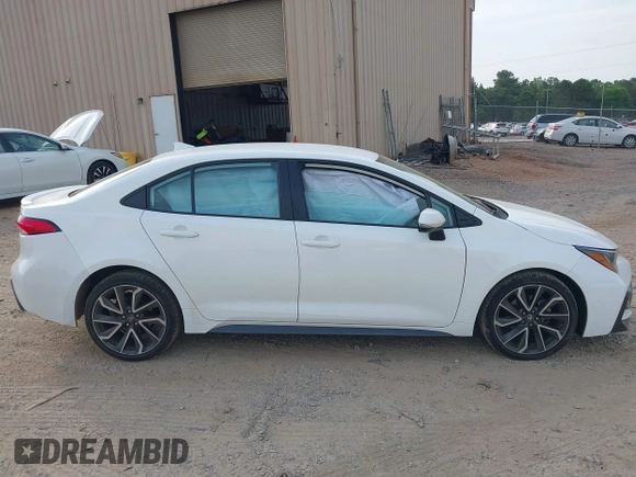 2022 Toyota Corolla SE with VIN 5YFS4MCE0NP136332, listed as a IAAI auction lot 42094001 with 36,371 mi miles and . Bid and sale history available at DreamBid. Image 13.