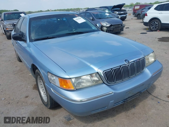 2000 Mercury Grand Marquis LS z VIN 2MEFM75W1YX673105, wystawiony jako IAAI lot #42050980 z przebiegiem 154 944 mil mil oraz . Historia ofert i sprzedaży dostępna na DreamBid. Obrazek 1.