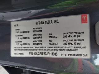 2018 Tesla Model 3 Long Range Battery with VIN 5YJ3E1EB7JF114305, listed as a IAAI auction lot 41765994 with 76,945 mi miles and . Bid and sale history available at DreamBid. Image 9.