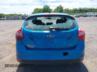 2012 Ford Focus SE z VIN 1FAHP3K29CL230126, wystawiony jako IAAI lot #42306310 z przebiegiem 143 981 mil mil oraz . Historia ofert i sprzedaży dostępna na DreamBid. Obrazek 6.