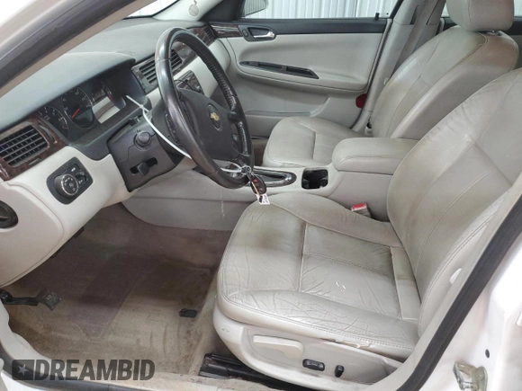 2012 Chevrolet Impala LTZ with VIN 2G1WC5E3XC1102909, listed as a Copart auction lot 52786605 with 185,134 mi miles and Salvage Title. Bid and sale history available at DreamBid. Image 7.